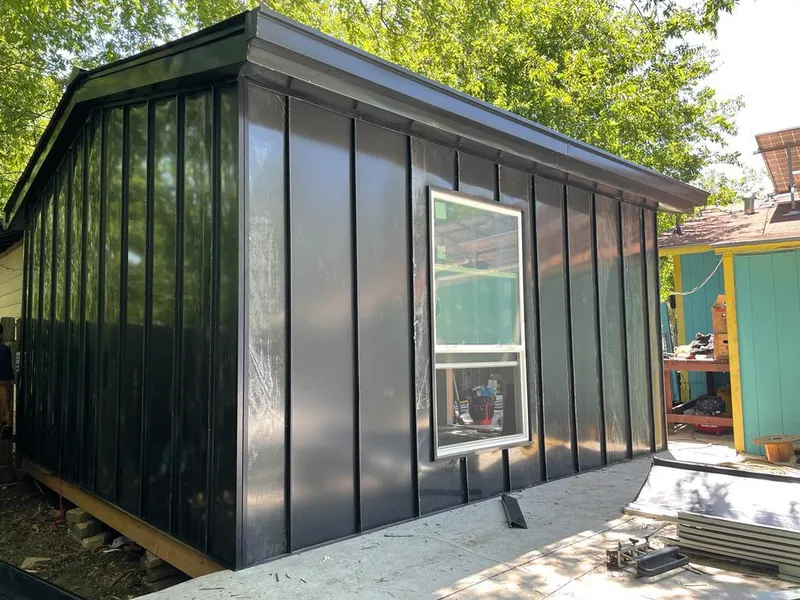 Black standing seam metal wall panels for Metal Roof Installation in Grant-Valkaria